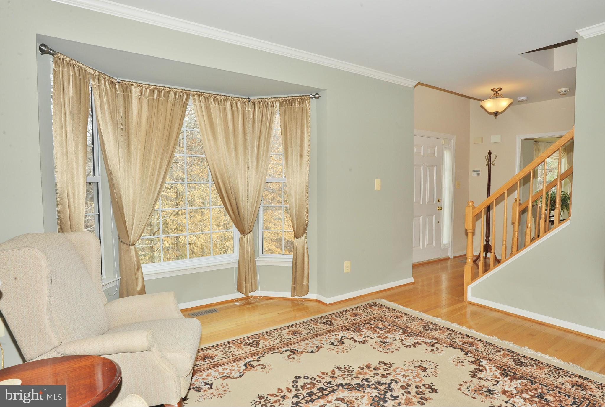 5700 Clapham Road Alexandria, VA 22315 - Photo 9 of 30 a view of a bedroom with furniture and a window
