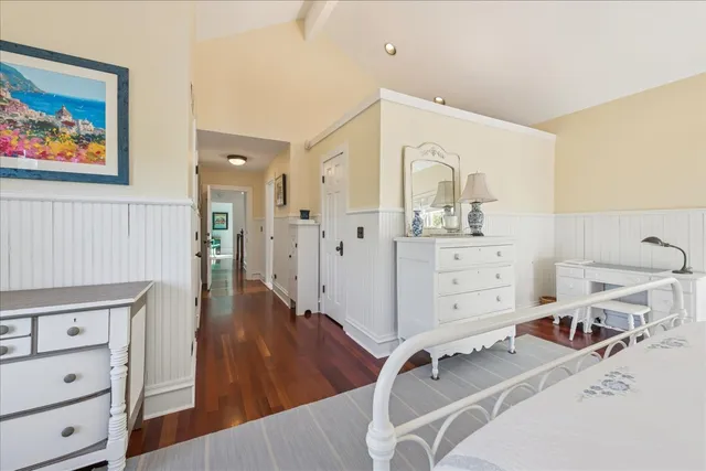 a bathroom with a sink a mirror and a shower