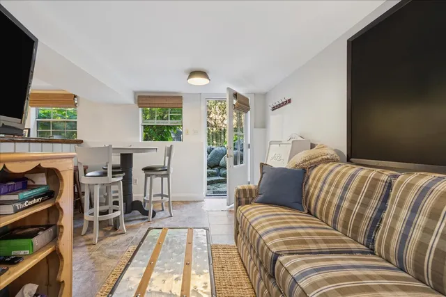 a bathroom with a toilet sink and shower