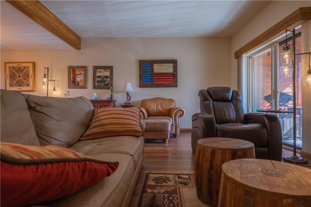 7 Lookout Ridge Drive, Unit 7 Dillon, CO 80435 - Photo 2 of 35 a living room with furniture and large windows