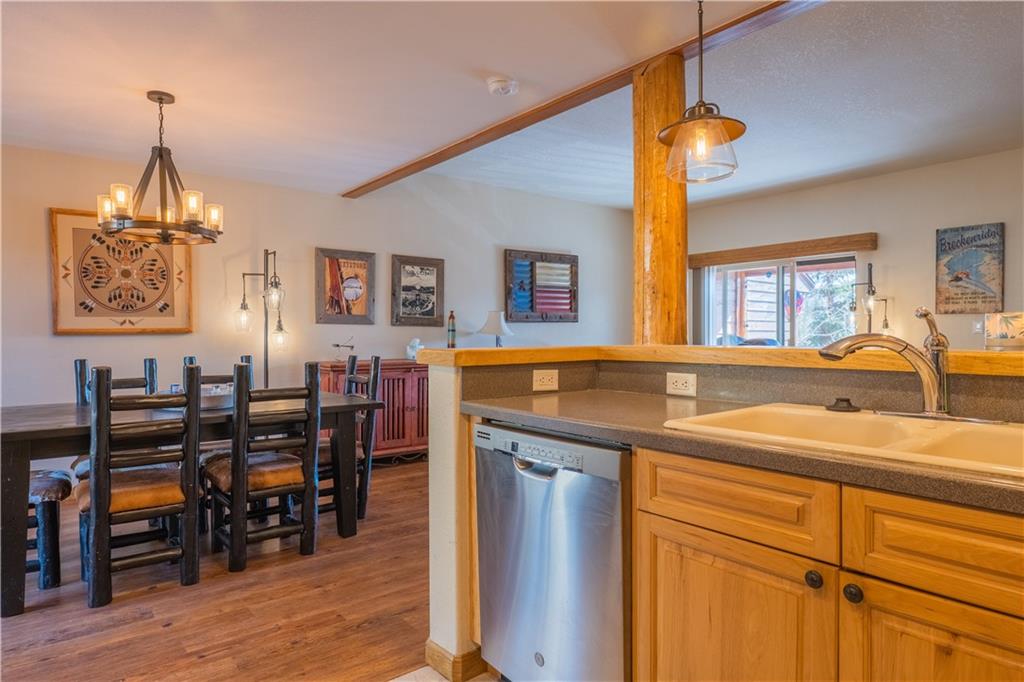 7 Lookout Ridge Drive, Unit 7 Dillon, CO 80435 - Photo 11 of 35 a view of a kitchen area with furniture and wooden floor