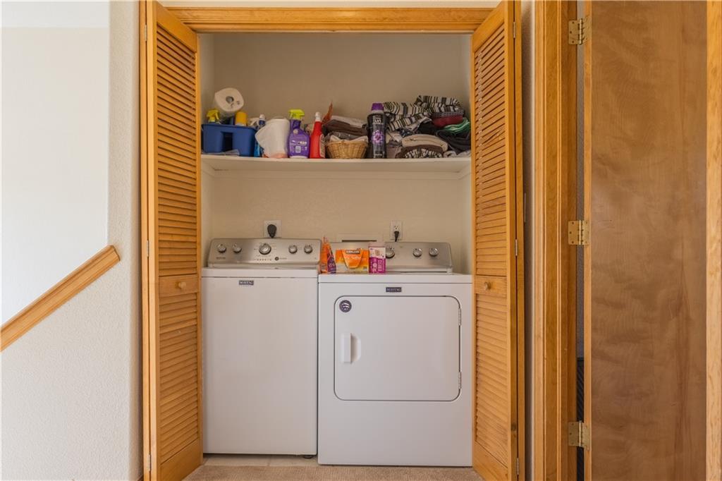 7 Lookout Ridge Drive, Unit 7 Dillon, CO 80435 - Photo 15 of 35 a utility room with dryer and washer