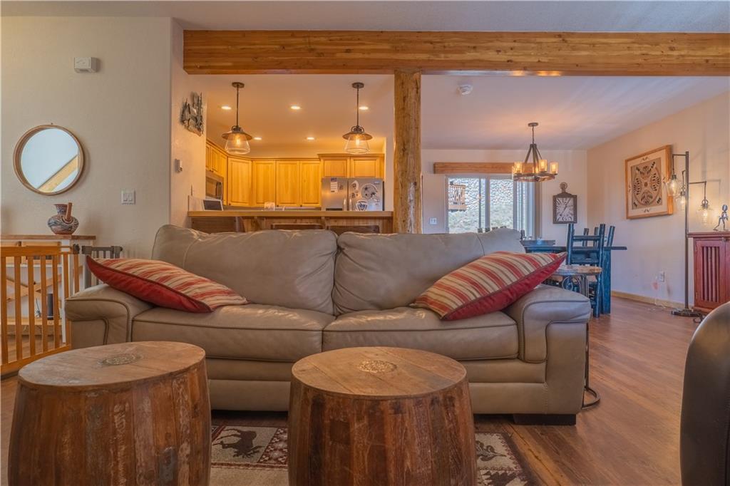 7 Lookout Ridge Drive, Unit 7 Dillon, CO 80435 - Photo 3 of 35 a living room with furniture and a large window