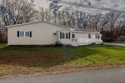 9 Register Avenue, Unit 2 Westport, MA 02790 - Photo 11 of 11 a house with trees in the background