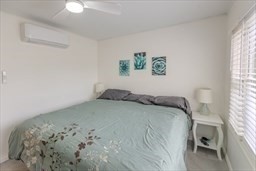 9 Register Avenue, Unit 2 Westport, MA 02790 - Photo 10 of 11 a bedroom with a bed and a window