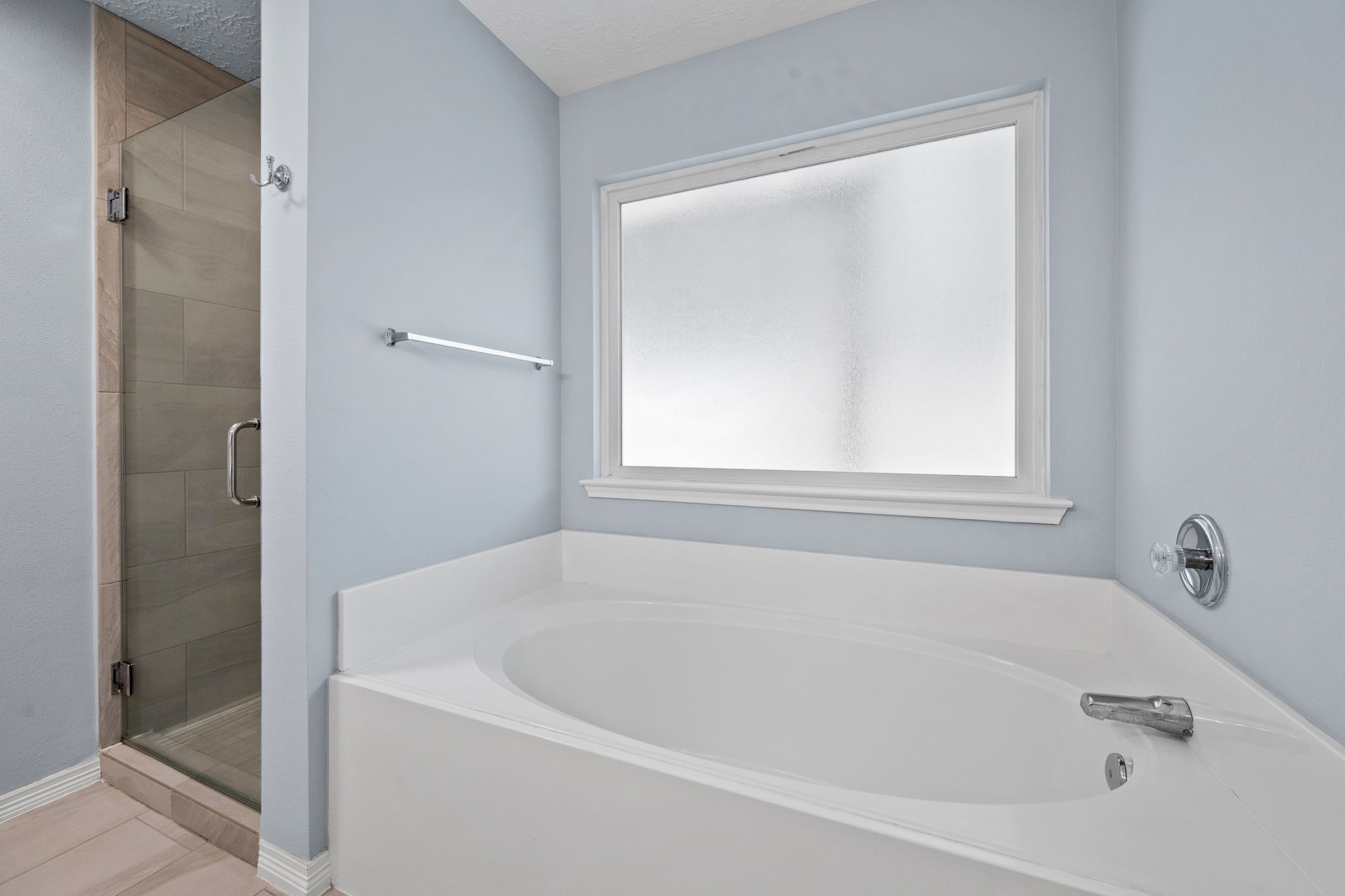 21893 Pinewilde Court Porter, TX 77365 - Photo 11 of 25 a white bath tub sitting next to a window