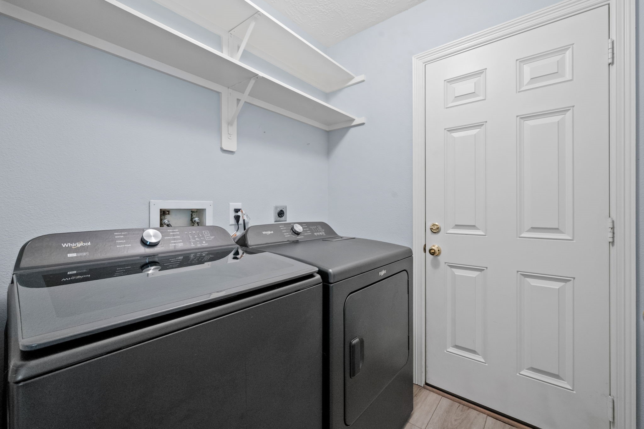 21893 Pinewilde Court Porter, TX 77365 - Photo 15 of 25 a utility room with dryer and washer