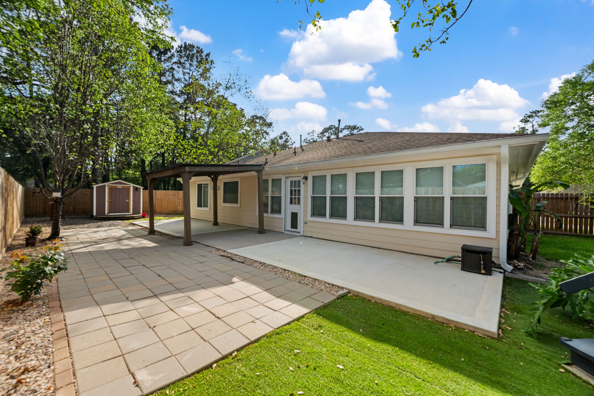 21893 Pinewilde Court Porter, TX 77365 - Photo 4 of 25 a house view with a garden space