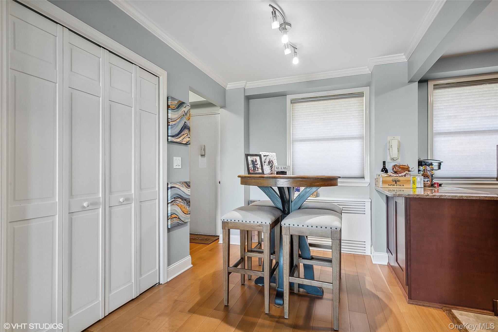 5800 Arlington Avenue, Unit 19L Bronx, NY 10471 - Photo 12 of 19 a very nice looking dining room with furniture and a window
