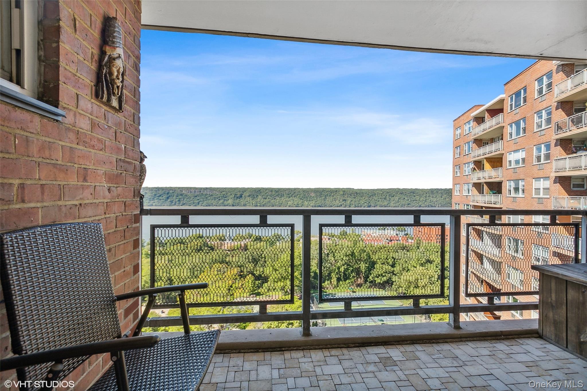 5800 Arlington Avenue, Unit 19L Bronx, NY 10471 - Photo 2 of 19 a view of a living room and a floor to ceiling window