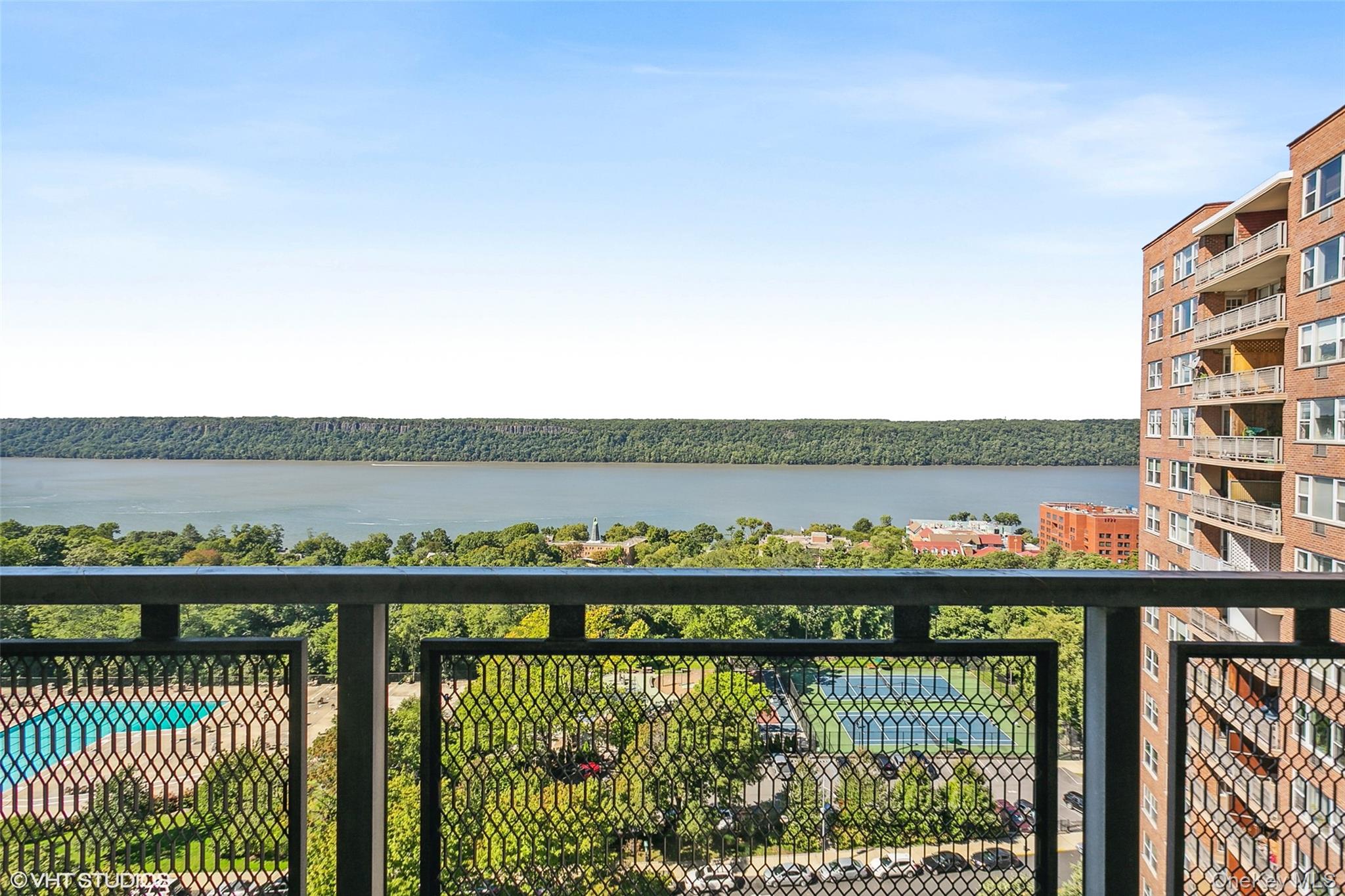 5800 Arlington Avenue, Unit 19L Bronx, NY 10471 - Photo 4 of 19 a city view from a balcony