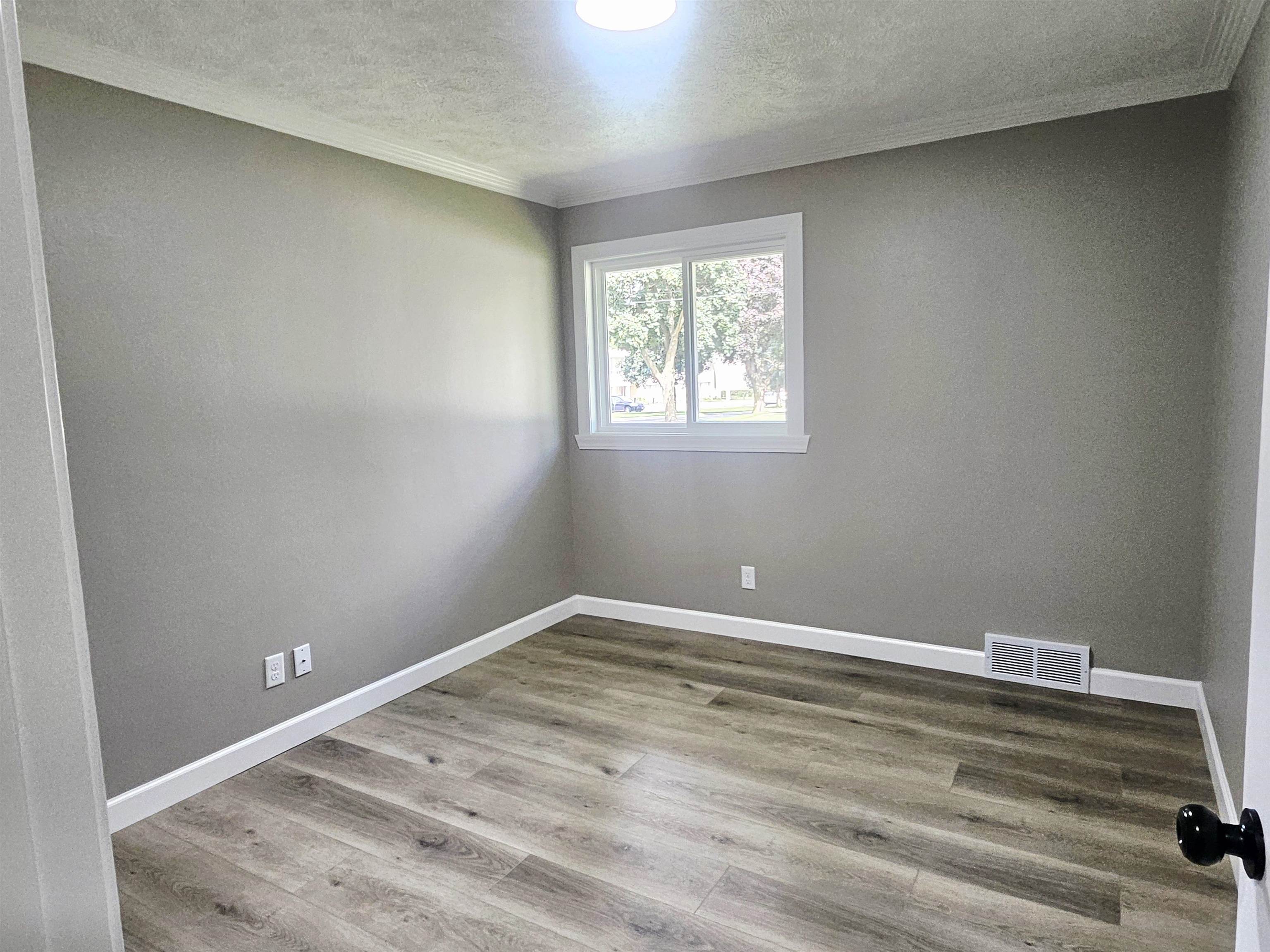 3121 Rural Street Rockford, IL 61107 - Photo 12 of 23 a view of a room with wooden floor