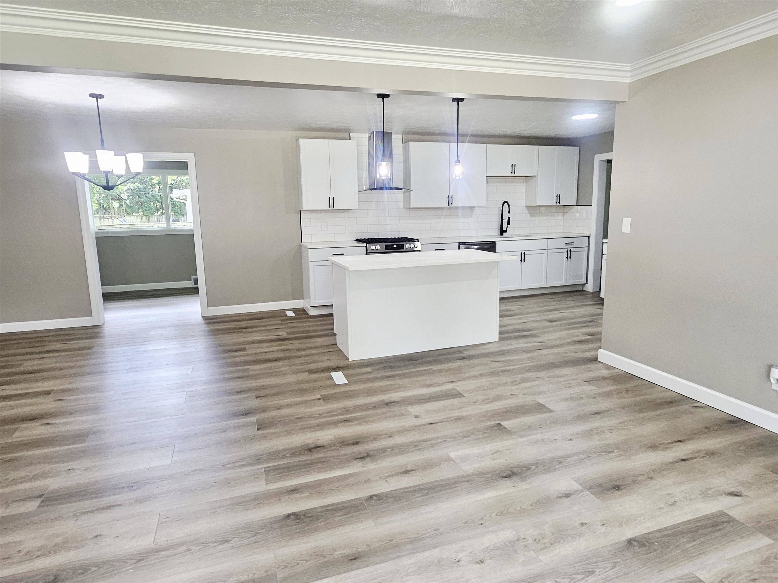 3121 Rural Street Rockford, IL 61107 - Photo 5 of 23 a view of kitchen with wooden floor