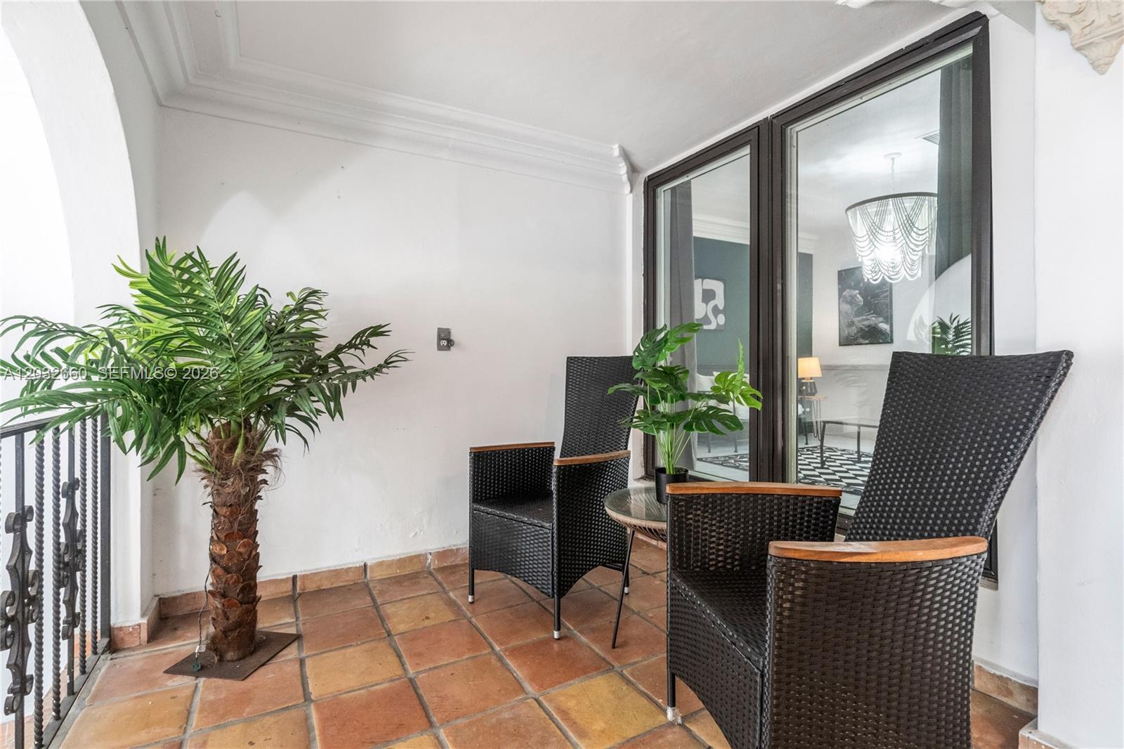520 Southwest 22nd Road Miami, FL 33129 - Photo 28 of 76 a view of a livingroom with furniture and a potted plant