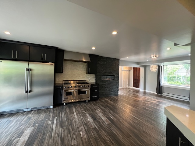 14935 West Old School Road Mettawa, IL 60048 - Photo 17 of 68 a kitchen with stainless steel appliances a refrigerator and a stove top oven