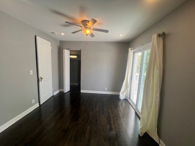 14935 West Old School Road Mettawa, IL 60048 - Photo 32 of 68 an empty room with wooden floor and windows