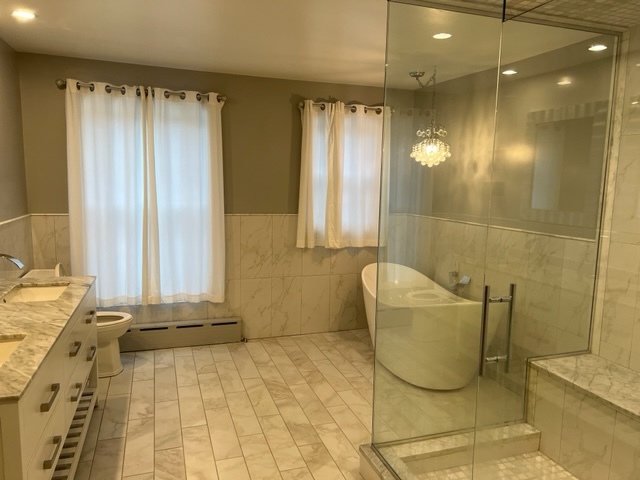 14935 West Old School Road Mettawa, IL 60048 - Photo 38 of 68 a bathroom with a bathtub and shower