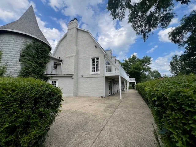 a view of an empty room with a balcony