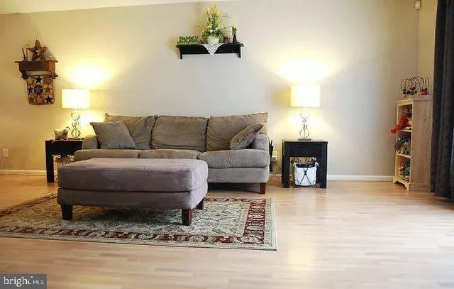 a living room with furniture and a couch