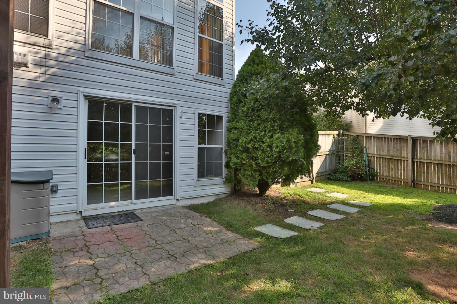 1518 Ringe Drive Severn, MD 21144 - Photo 29 of 30 a front view of a house with a yard and garage