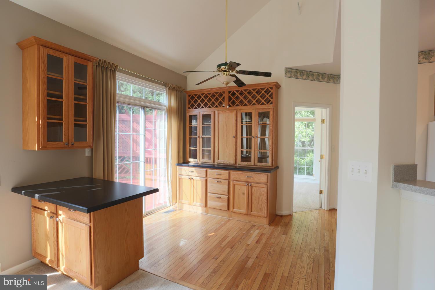 1518 Ringe Drive Severn, MD 21144 - Photo 7 of 30 a kitchen with granite countertop a stove and a sink