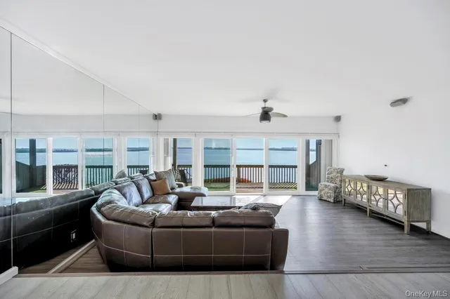 a view of balcony with wooden floor