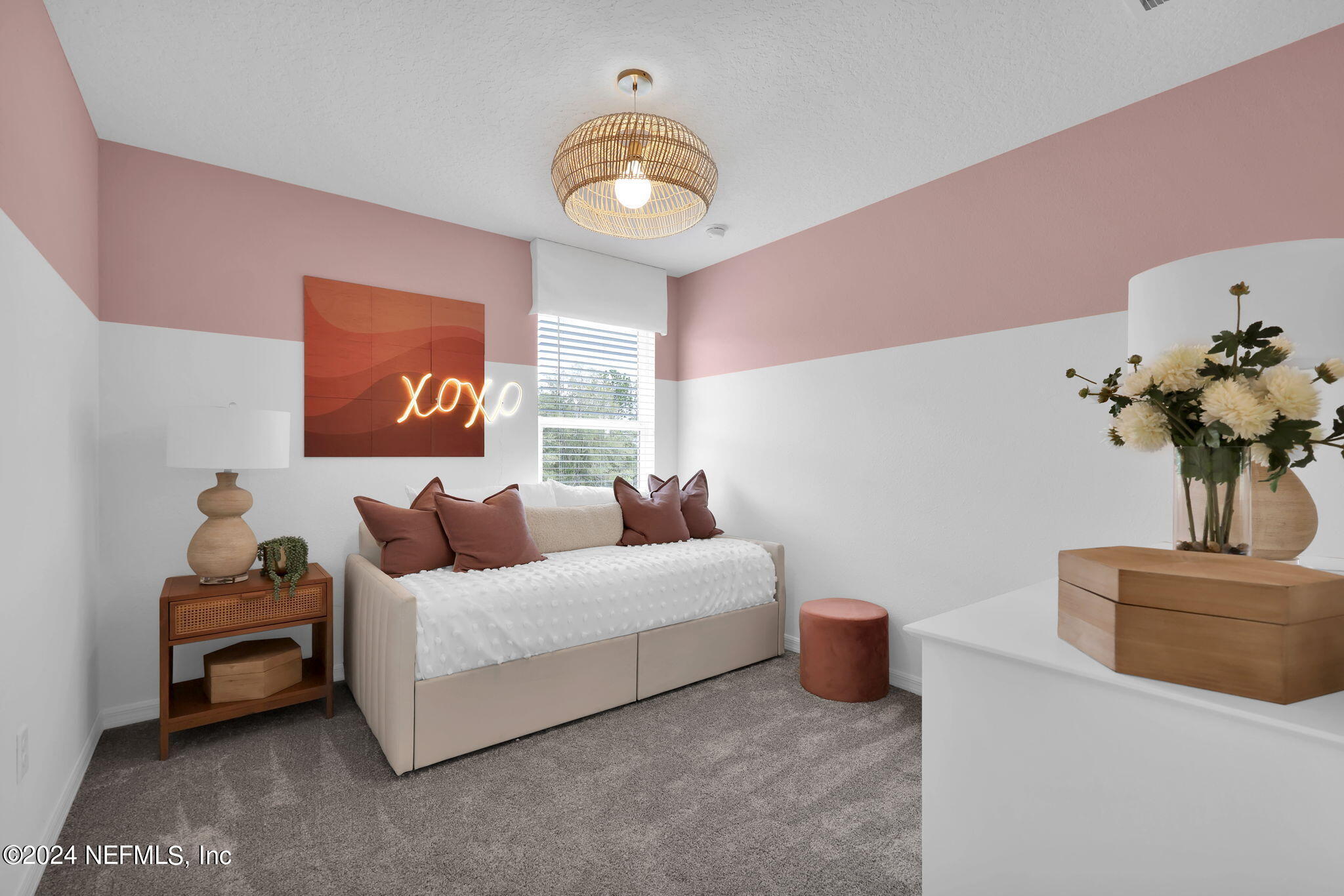 5460 Integrity Way Jacksonville, FL 32244 - Photo 28 of 31 a living room with furniture and a chandelier