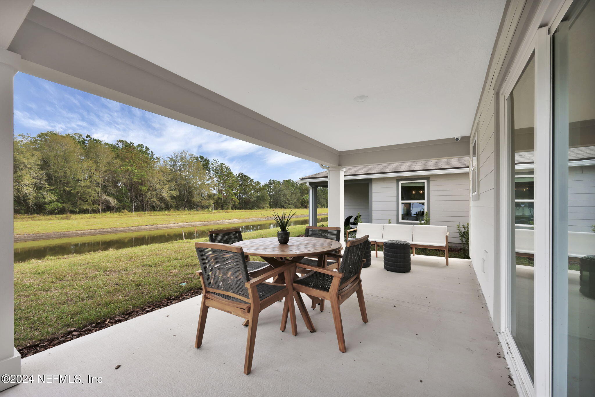 5460 Integrity Way Jacksonville, FL 32244 - Photo 30 of 31 a view of an outdoor space with furniture and garden