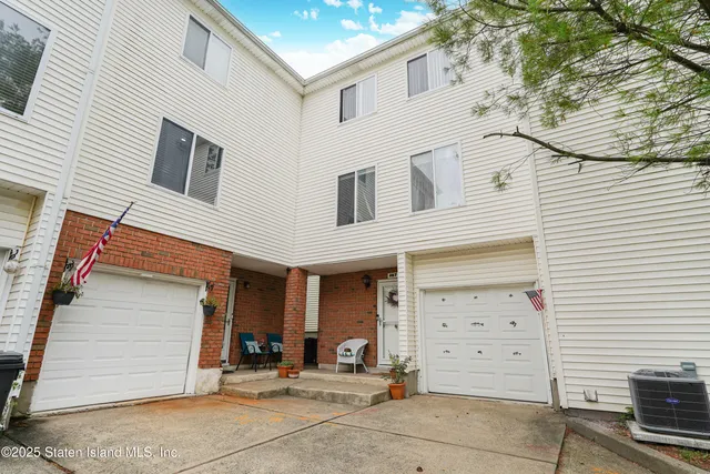 a view of a house with a garage