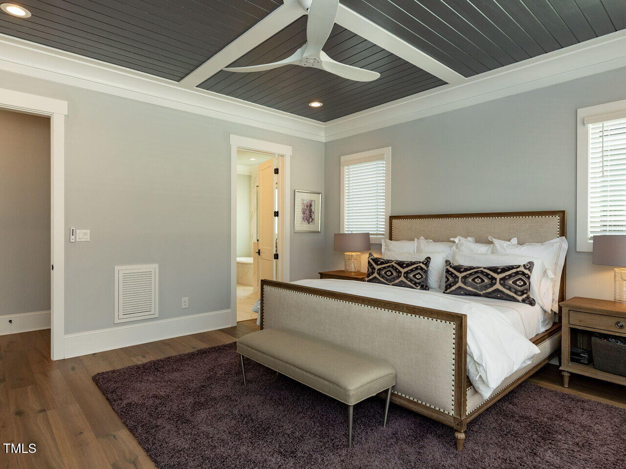 3416 Edgemont Drive Raleigh, NC 27612 - Photo 18 of 49 a bedroom with a bed and a rug