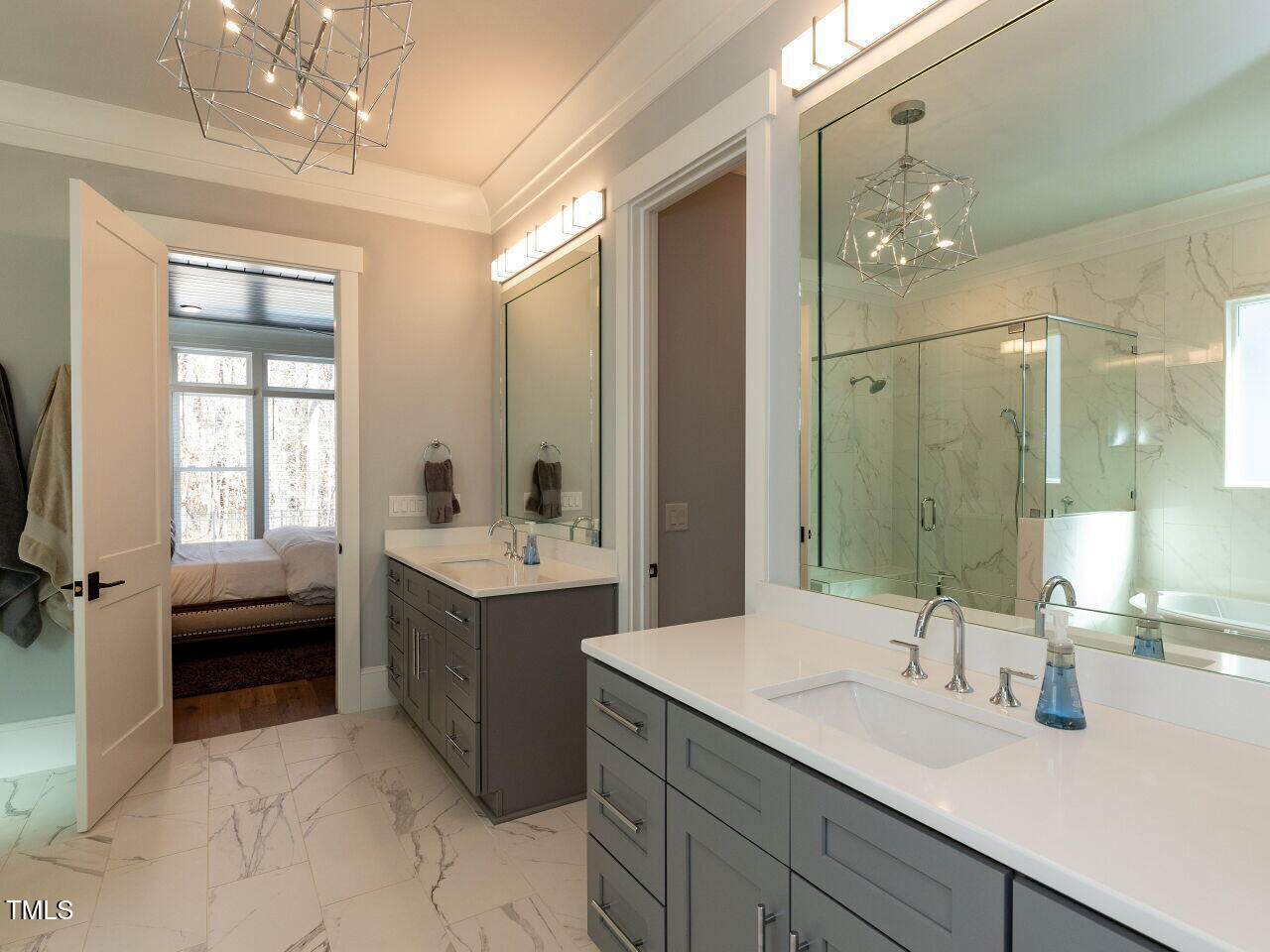 3416 Edgemont Drive Raleigh, NC 27612 - Photo 21 of 49 a bathroom with a tub sink and mirror