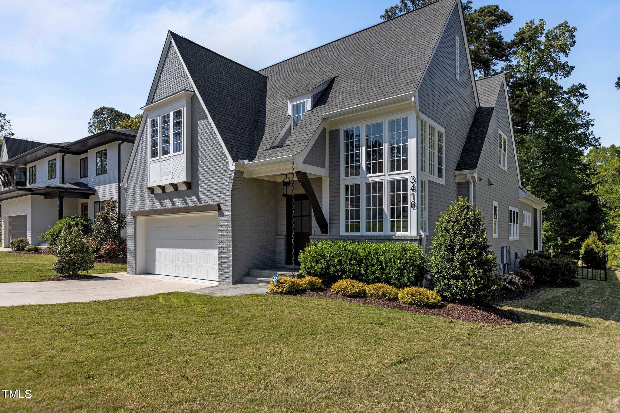 3416 Edgemont Drive Raleigh, NC 27612 - Photo 3 of 49 front view of a house with a yard