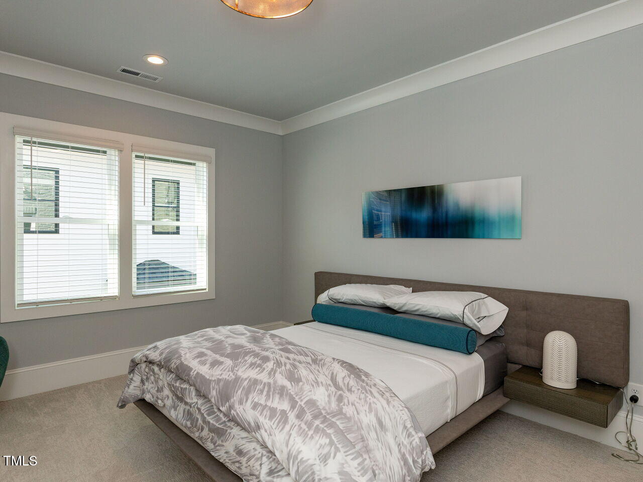 3416 Edgemont Drive Raleigh, NC 27612 - Photo 31 of 49 a bedroom with a bed and window