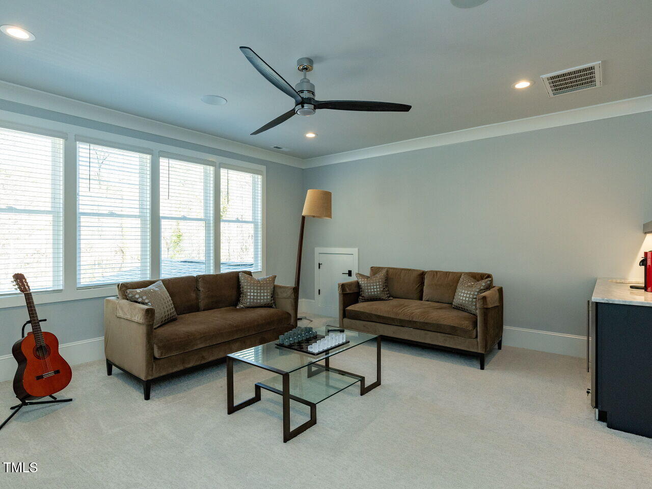 3416 Edgemont Drive Raleigh, NC 27612 - Photo 37 of 49 a living room with furniture and a large window