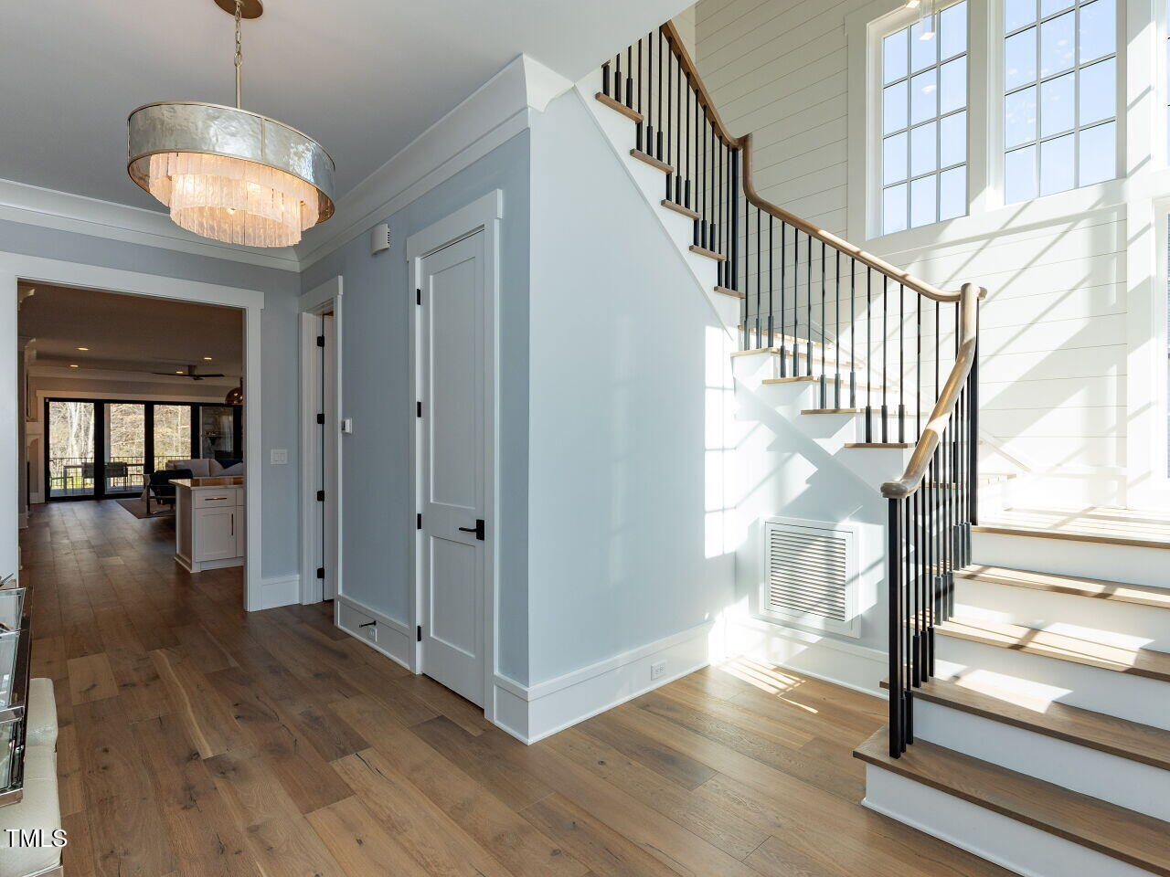 3416 Edgemont Drive Raleigh, NC 27612 - Photo 6 of 49 a view of entryway and hall with wooden floor