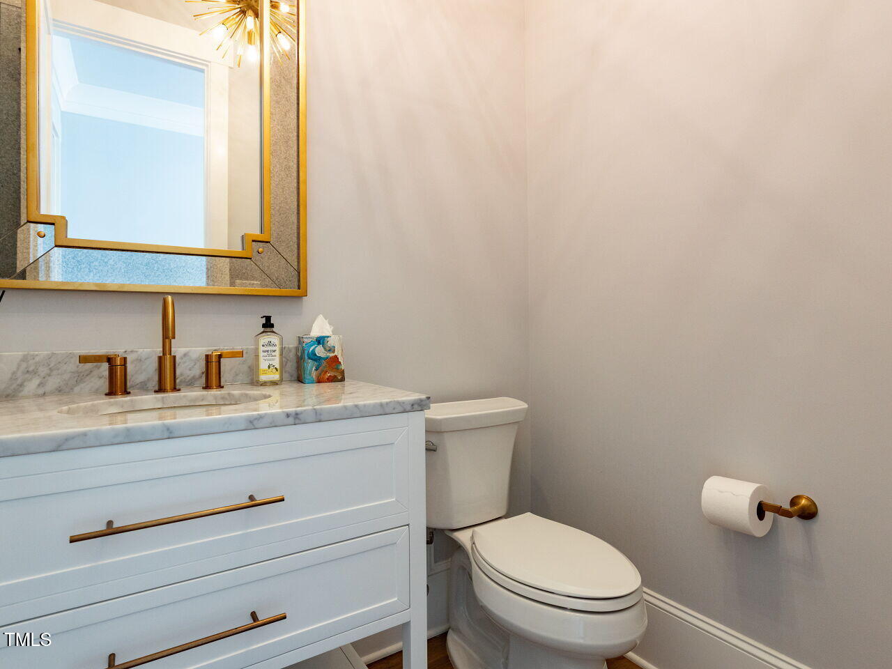 3416 Edgemont Drive Raleigh, NC 27612 - Photo 8 of 49 a bathroom with a granite countertop toilet and sink