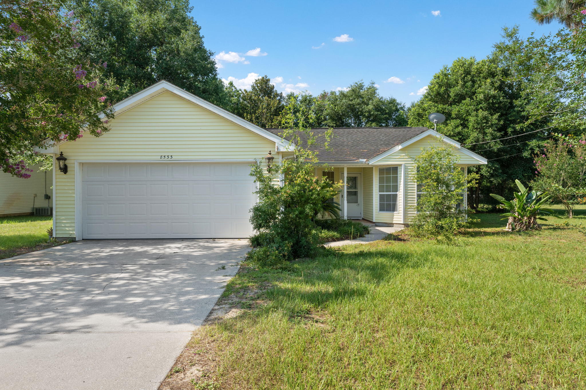 8533 Misty Ridge Lane Navarre, FL 32566 - Photo 1 of 31 Charming Yellow Home