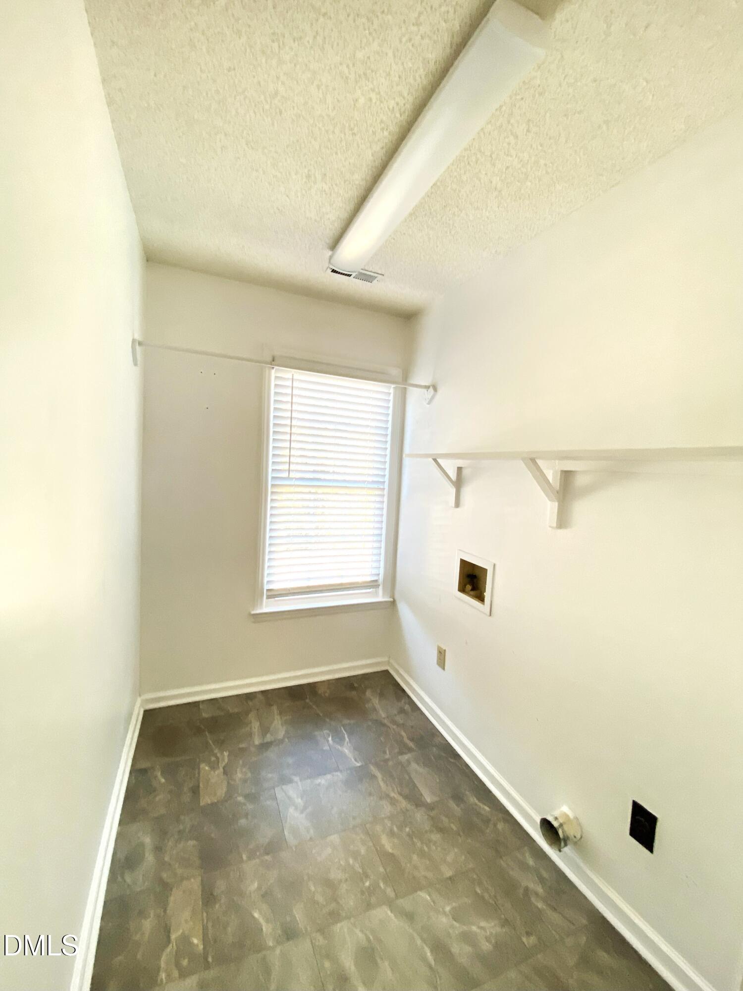 8136 Greywinds Drive Raleigh, NC 27615 - Photo 43 of 49 laundry
