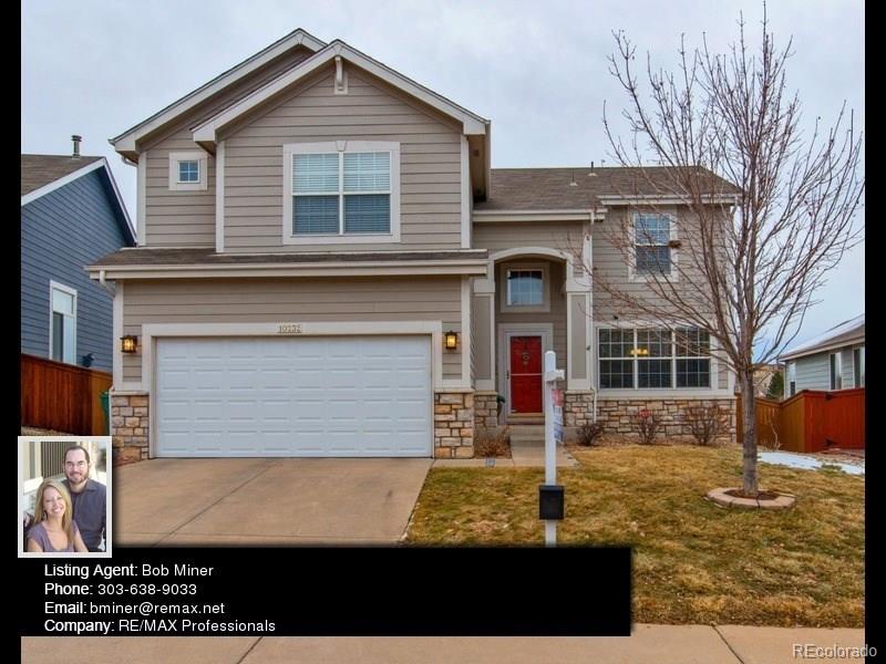 10232 Willowbridge Way Highlands Ranch, CO 80126 - Photo 1 of 33 a front view of a house with garden