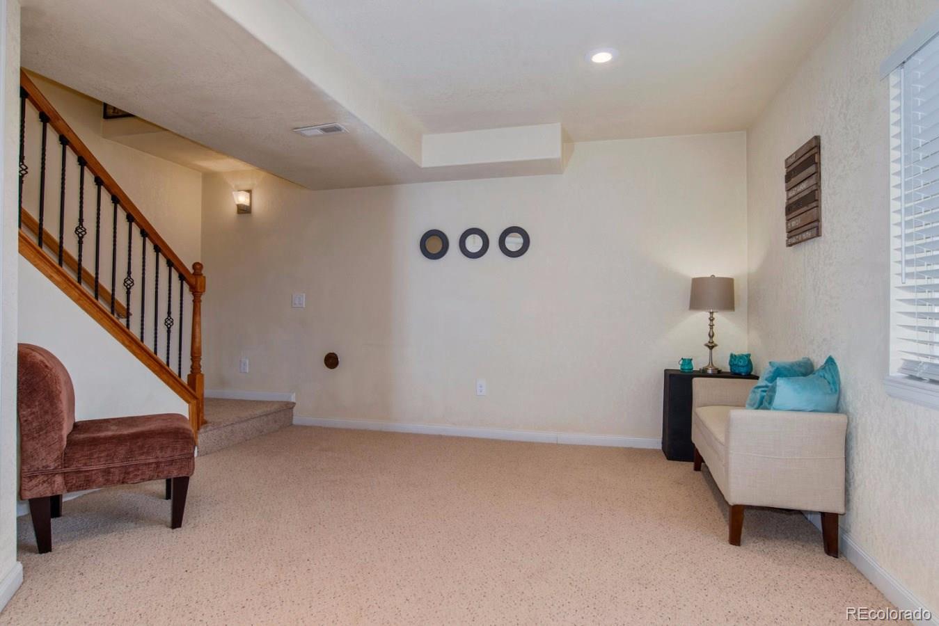 10232 Willowbridge Way Highlands Ranch, CO 80126 - Photo 25 of 33 a view of livingroom with furniture