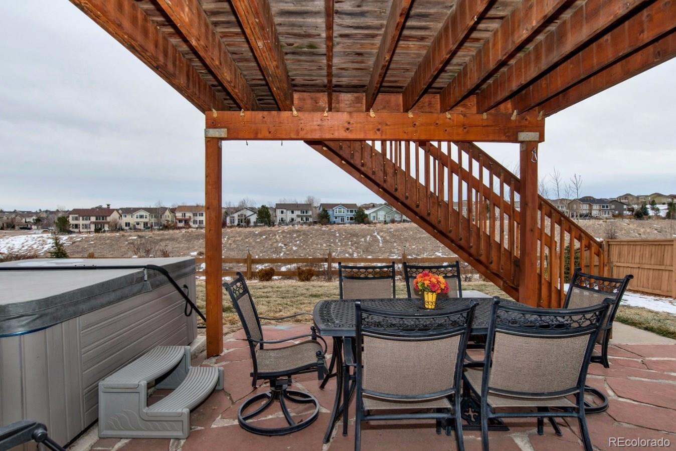 10232 Willowbridge Way Highlands Ranch, CO 80126 - Photo 27 of 33 a view of a chairs and table in the terrace