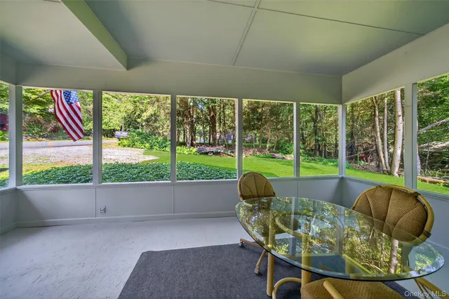 a living room with a couch and a table