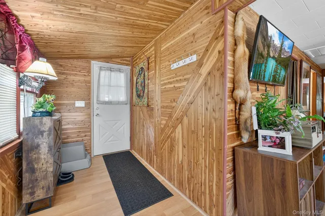 a view of a house with a potted plant