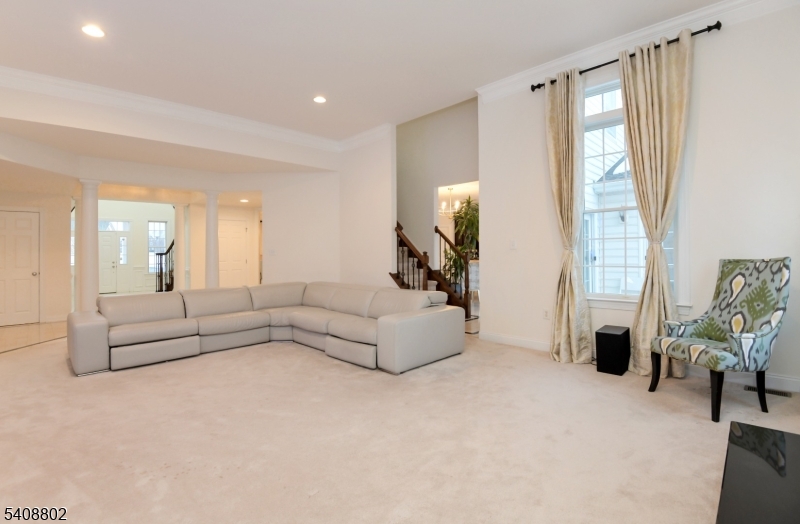 10 Raker Court Hillsborough, NJ 08844 - Photo 14 of 44 a living room with furniture and a large window