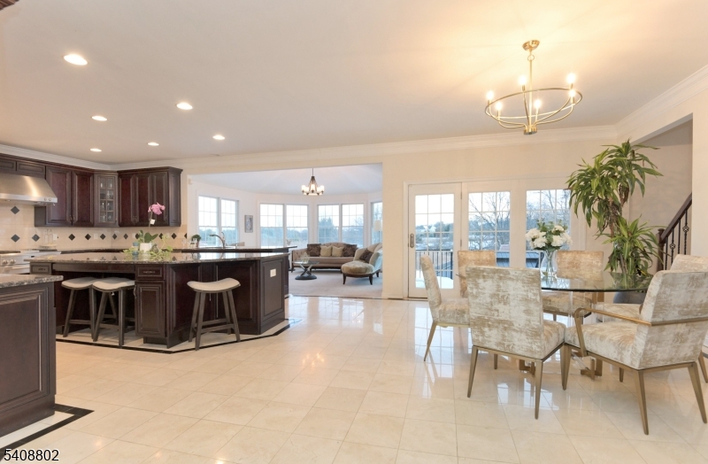 10 Raker Court Hillsborough, NJ 08844 - Photo 15 of 44 a kitchen with stainless steel appliances kitchen island granite countertop a sink and cabinets