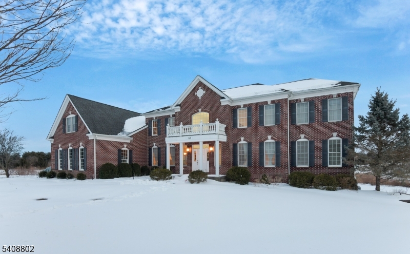 10 Raker Court Hillsborough, NJ 08844 - Photo 22 of 44 front view of a house with a yard