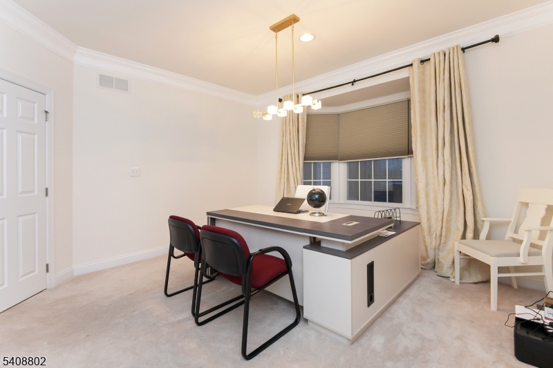 10 Raker Court Hillsborough, NJ 08844 - Photo 24 of 44 a kitchen with a stove and a table