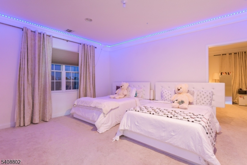 10 Raker Court Hillsborough, NJ 08844 - Photo 28 of 44 a bedroom with pink walls and pink walls