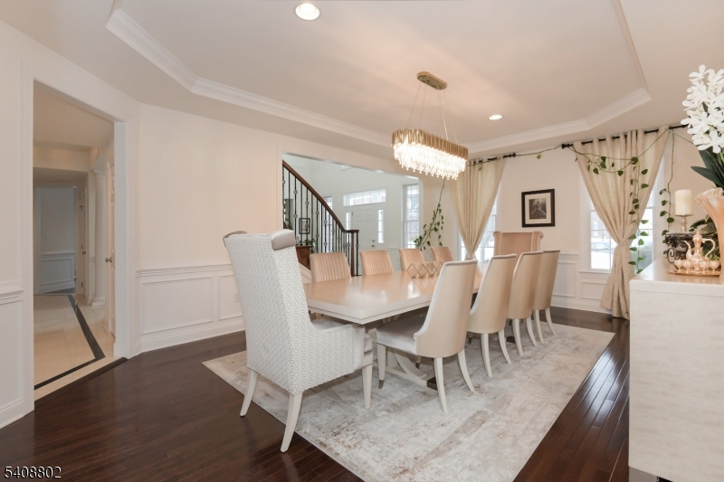 10 Raker Court Hillsborough, NJ 08844 - Photo 4 of 44 a view of a dining room with furniture and wooden floor