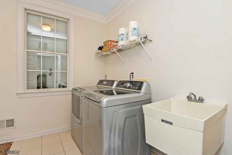 10 Raker Court Hillsborough, NJ 08844 - Photo 44 of 44 a utility room with dryer and washer